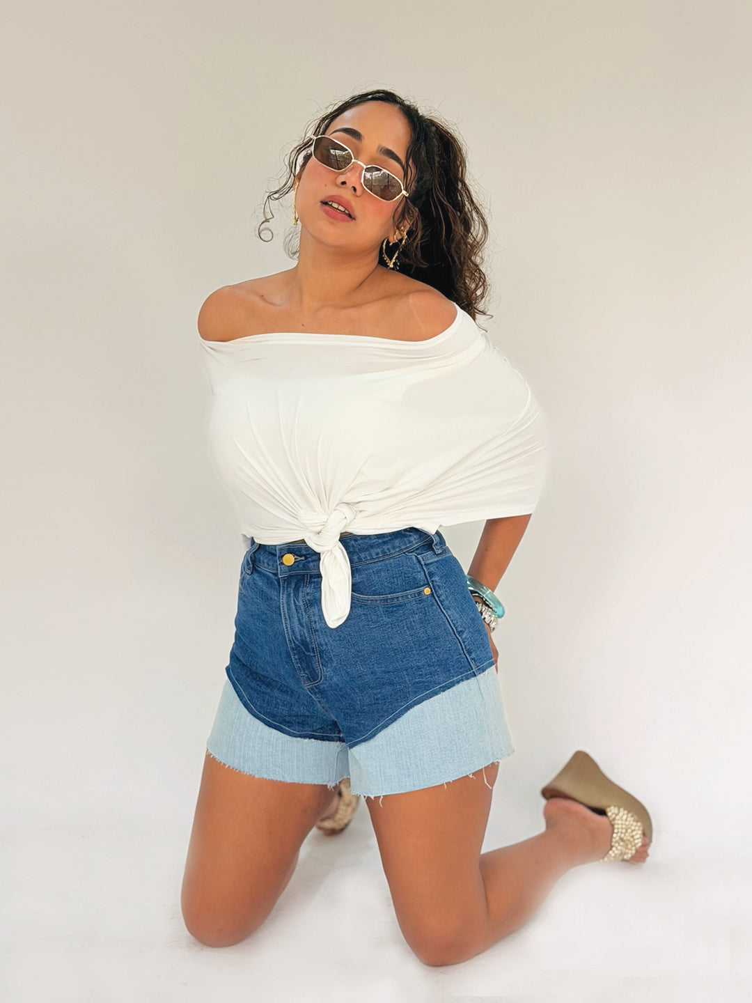 Person wearing blue denim shorts by Rerasa