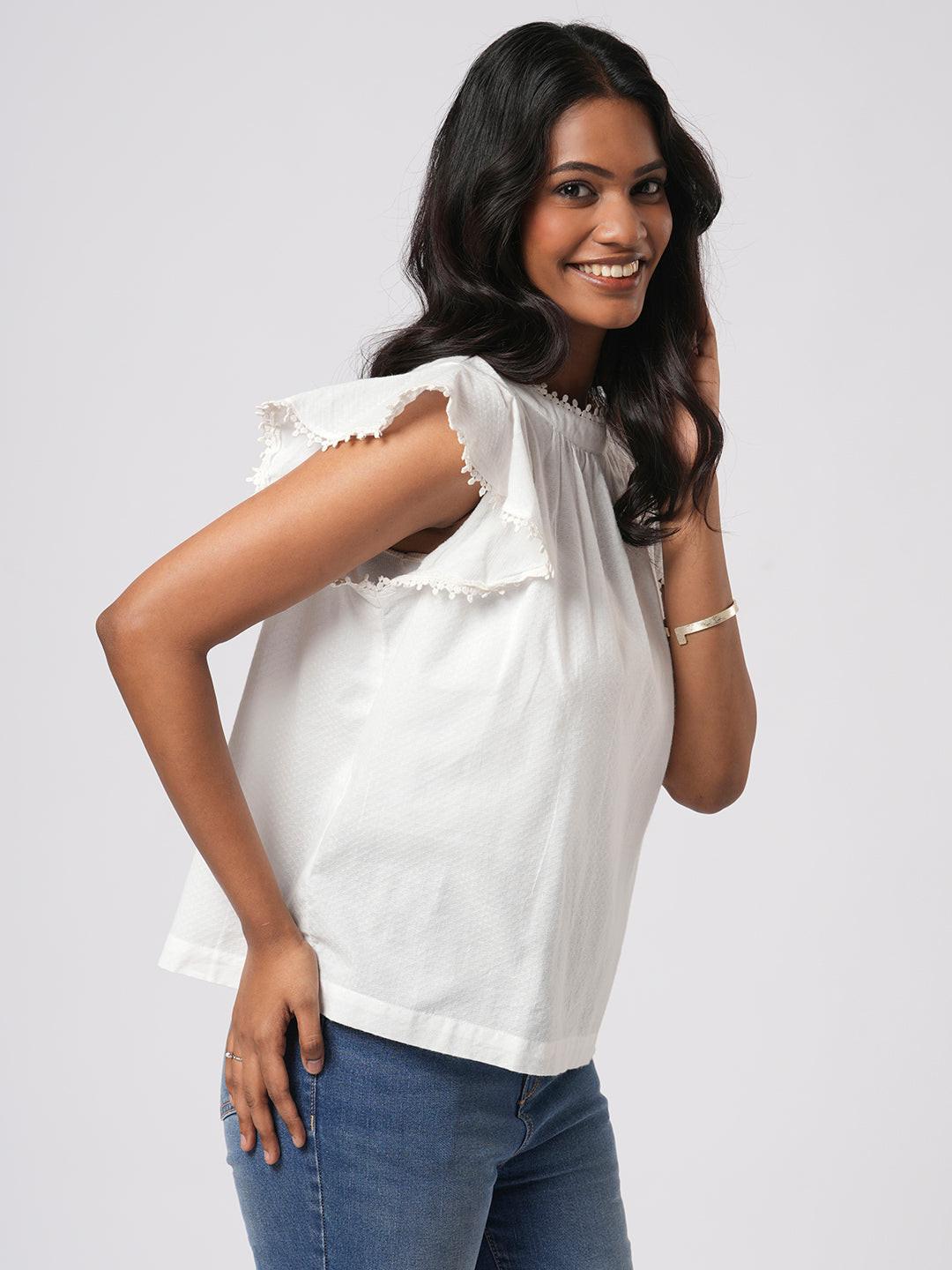 Lace Trimmed Flutter Sleeve Top.