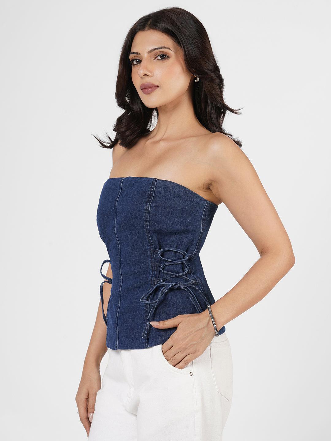 Woman in a blue strapless top by Rerasa