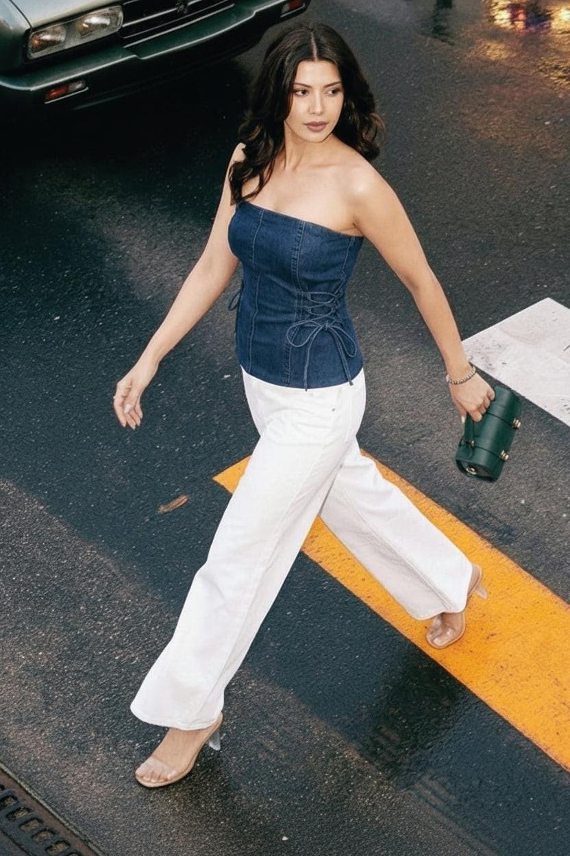 Woman in a blue strapless top by Rerasa