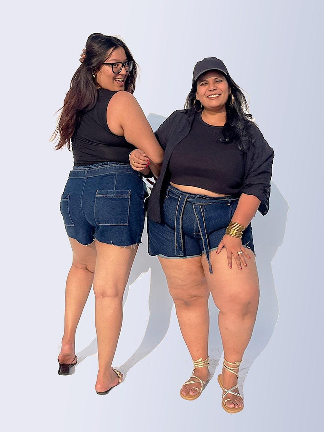 Friends twinning with blue denim shorts with a tie waist by Rerasa