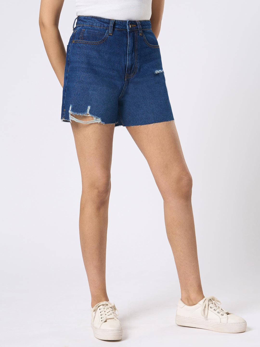 Person wearing blue denim shorts by Rerasa