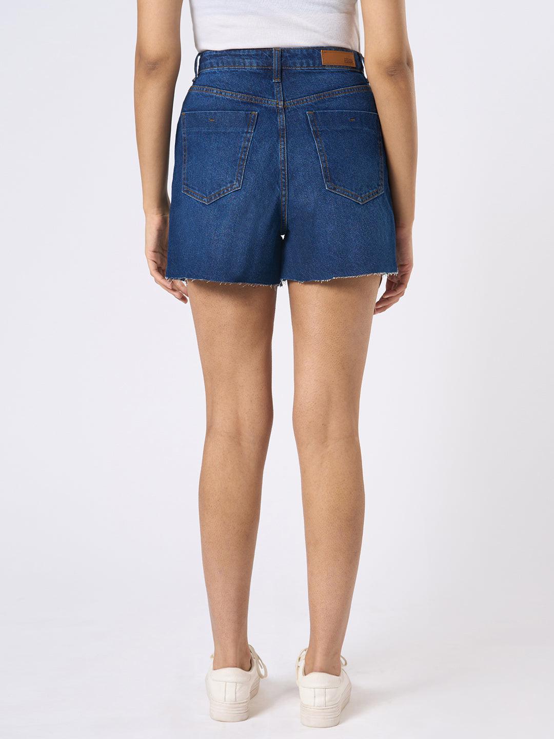 Person wearing blue denim shorts by Rerasa