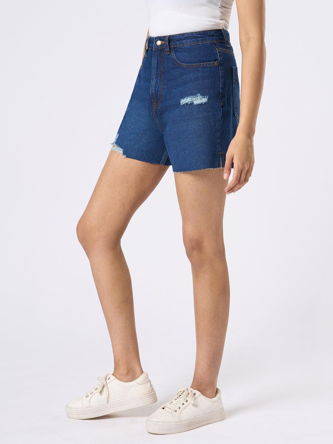 Person wearing blue denim shorts by Rerasa