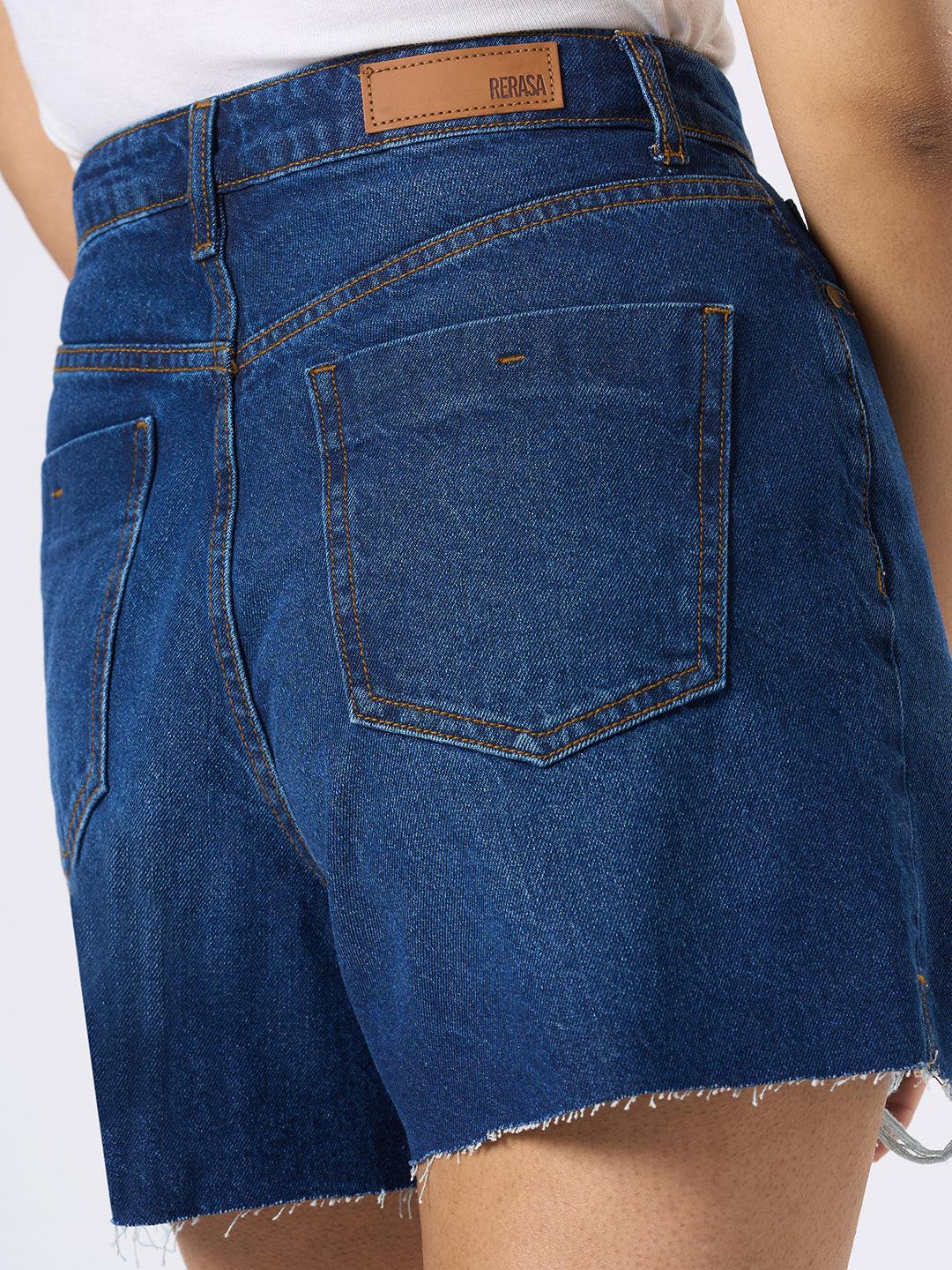 Person wearing blue denim shorts by Rerasa
