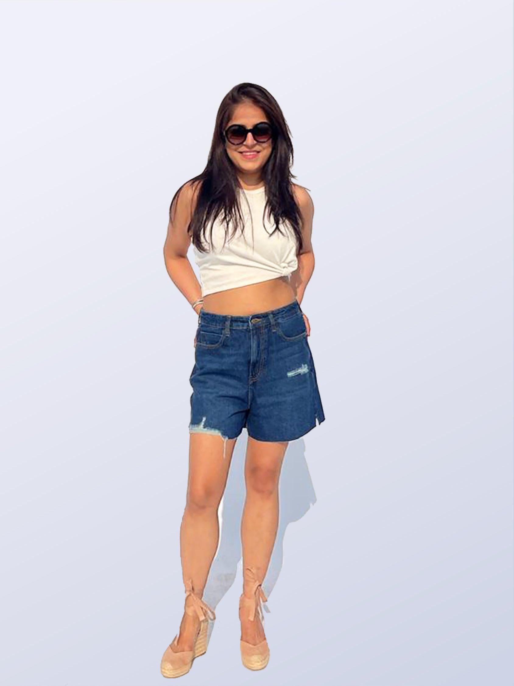 Person wearing blue denim shorts by Rerasa