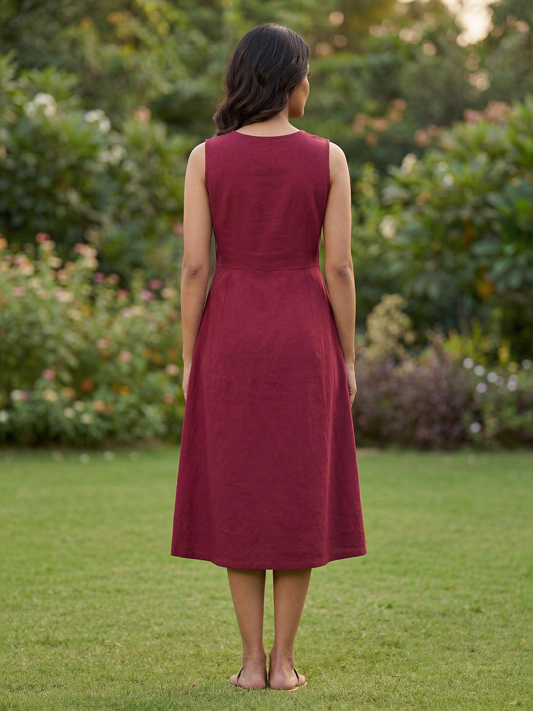 Woman wearing a maroon dress by Rerasa
