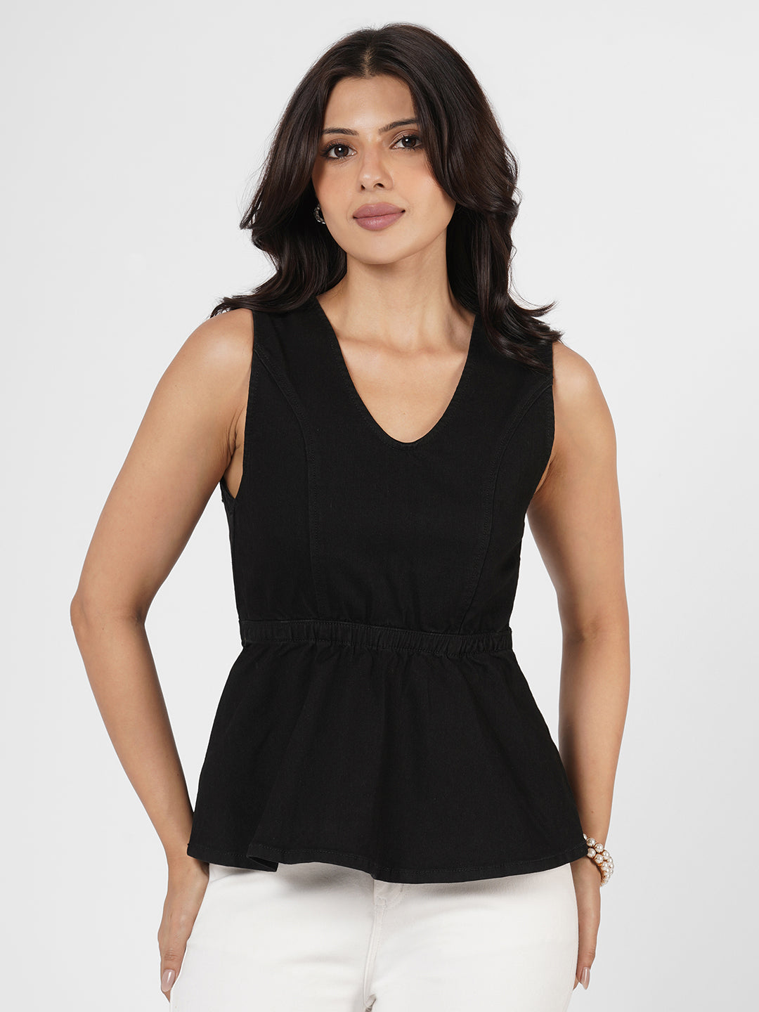 Woman wearing Structured Denim Peplum Top by Rerasa