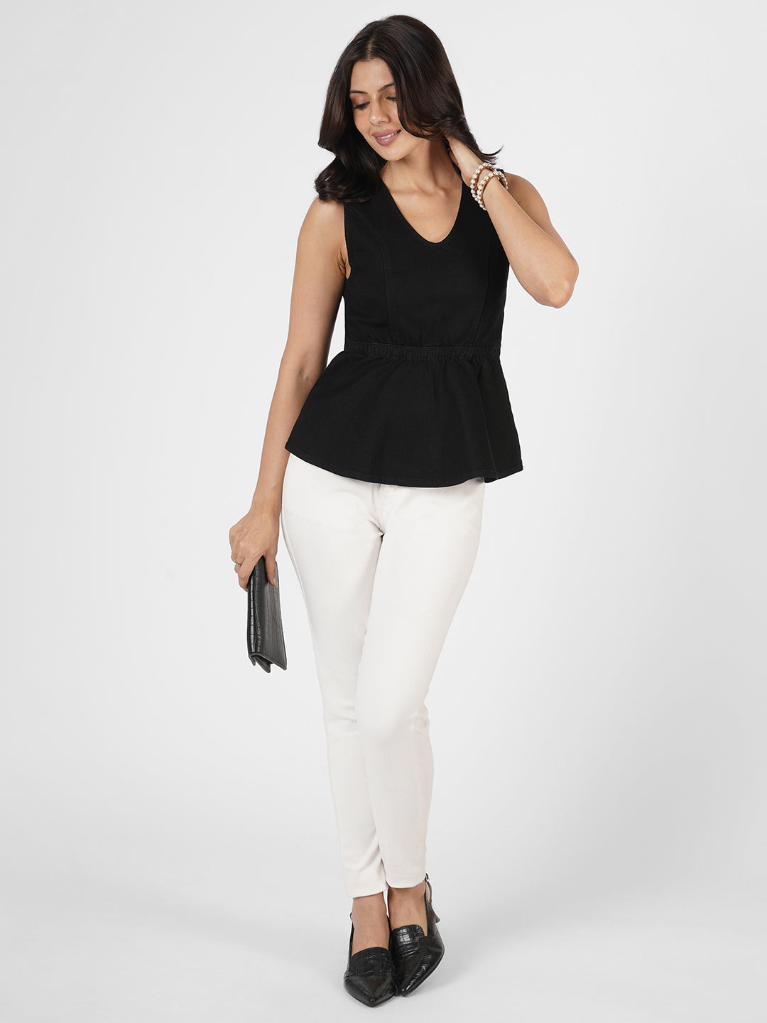Woman wearing Structured Denim Peplum Top by Rerasa