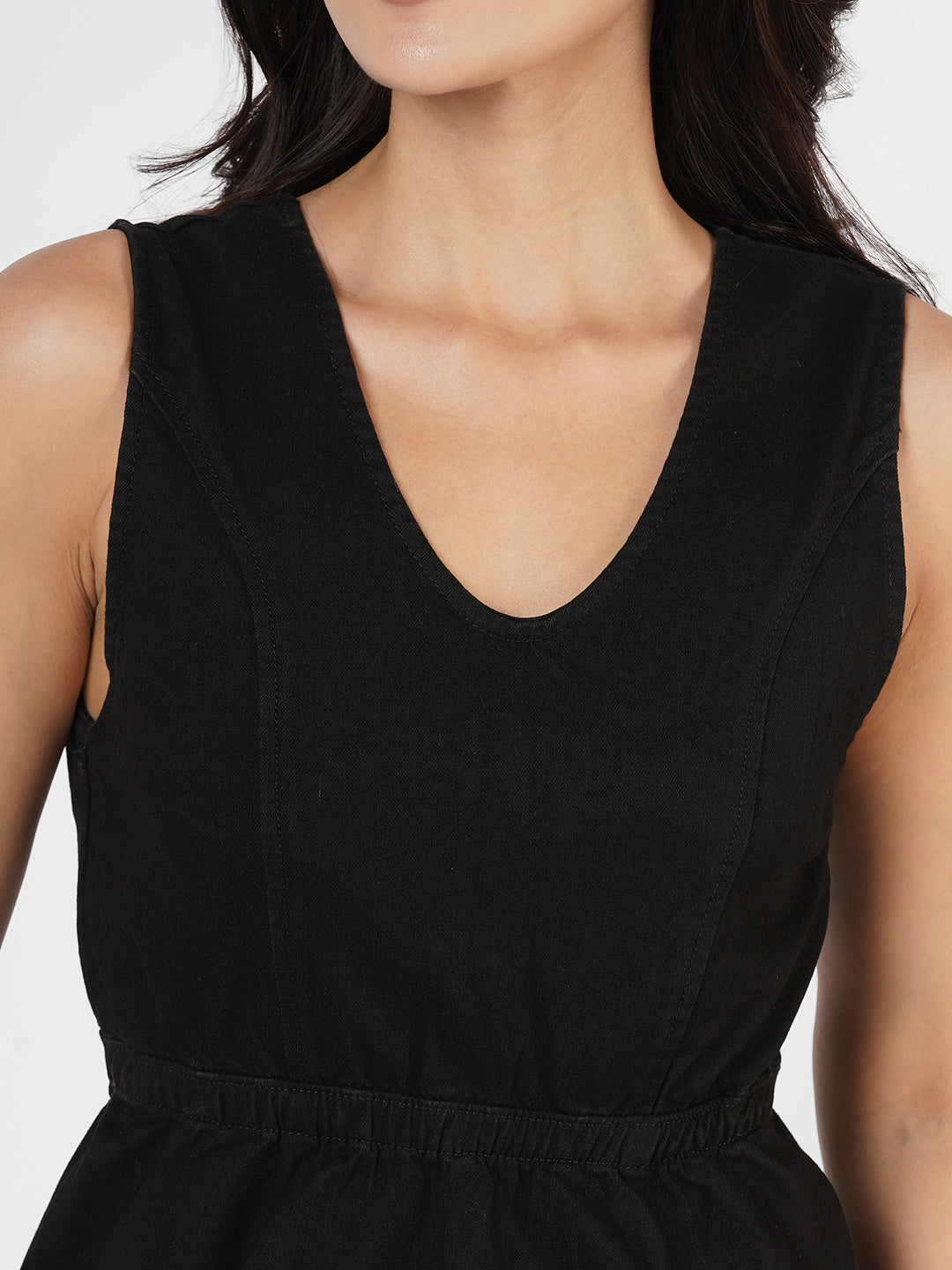 Woman wearing Structured Denim Peplum Top by Rerasa