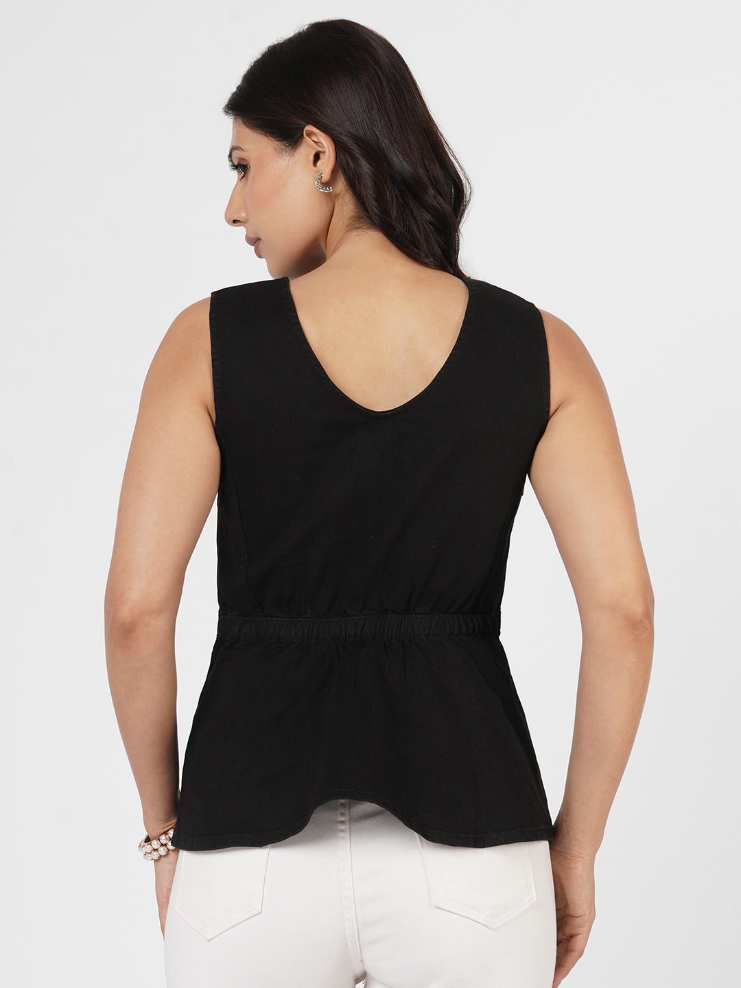 Woman wearing Structured Denim Peplum Top by Rerasa