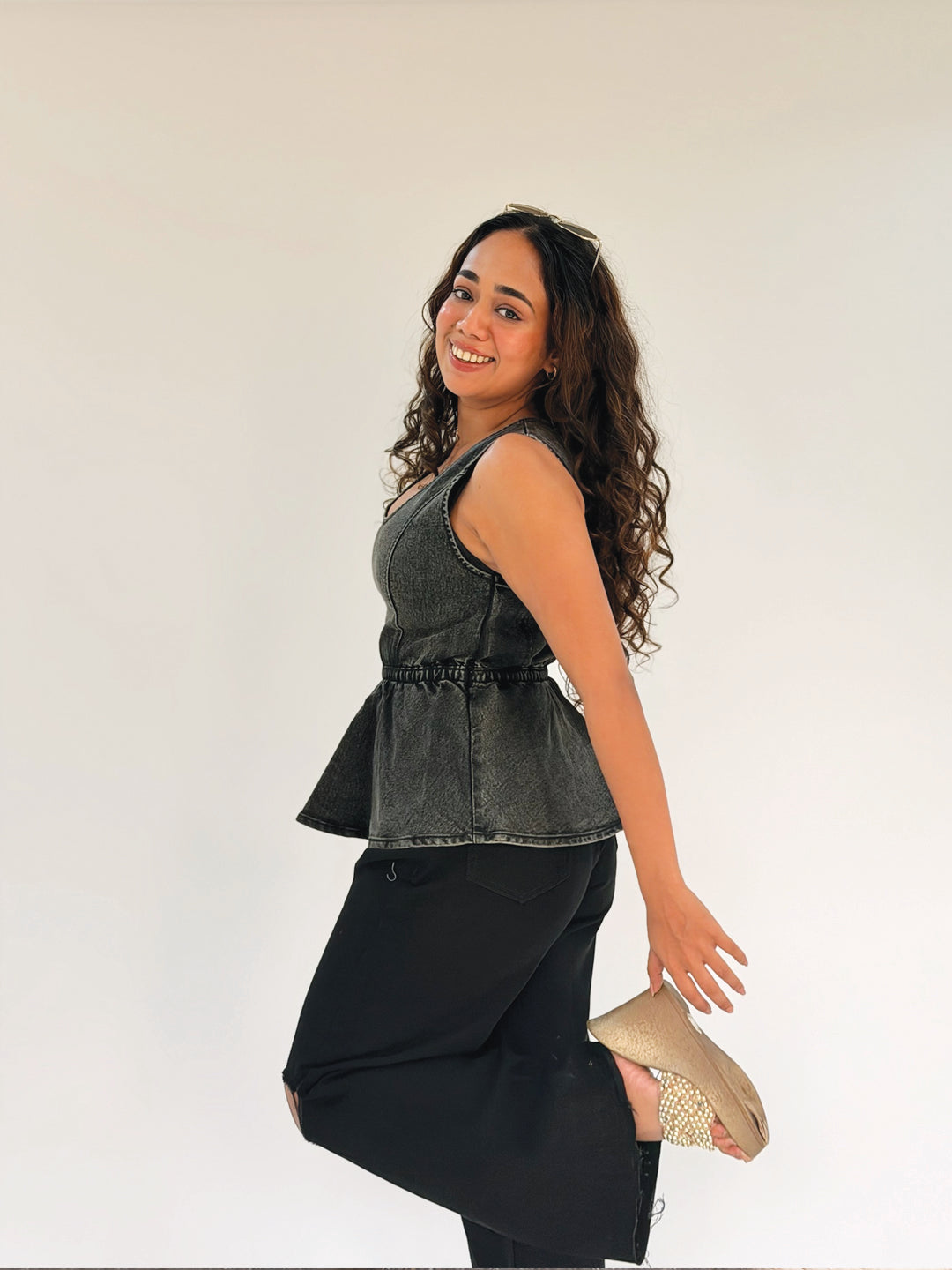 Woman wearing Structured Denim Peplum Top by Rerasa