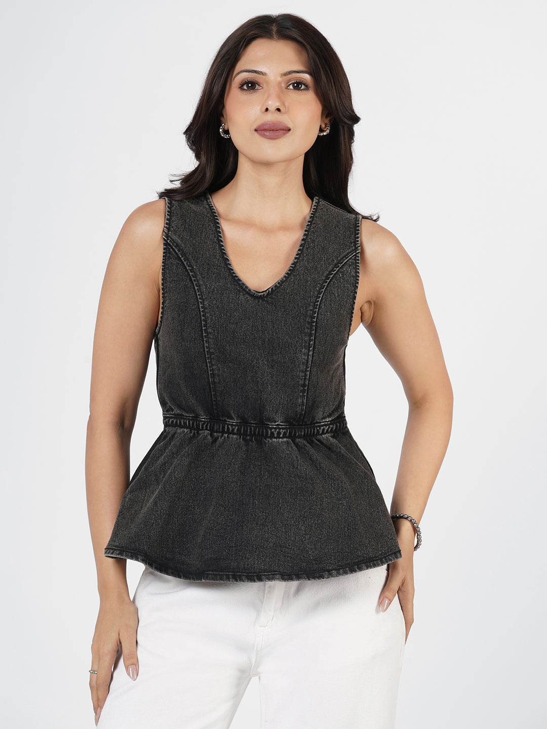 Woman wearing Structured Denim Peplum Top by Rerasa