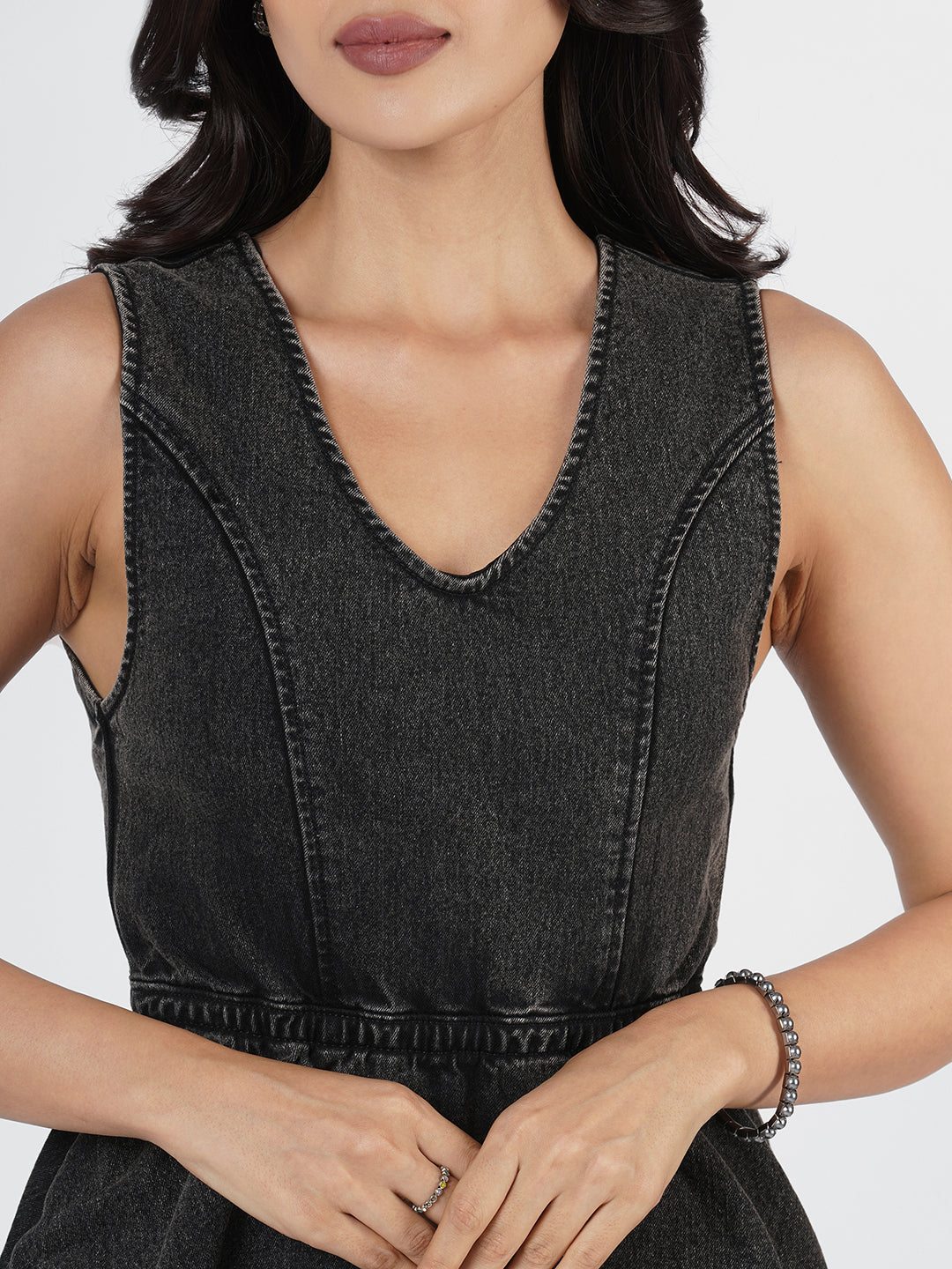 Woman wearing Structured Denim Peplum Top by Rerasa