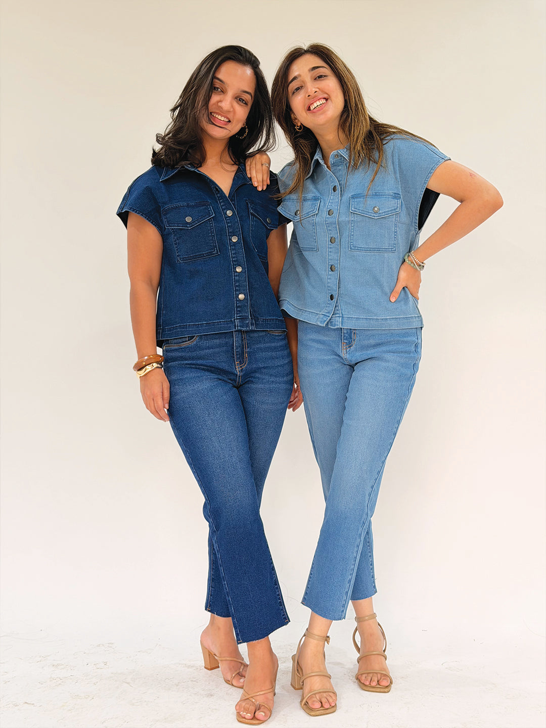 Two women wearing matching denim by Rerasa