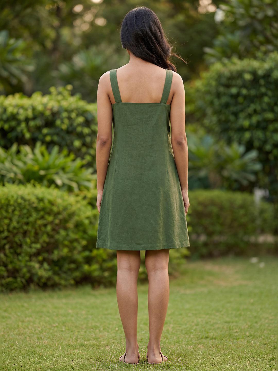 Woman wearing  Rerasa's green dress 