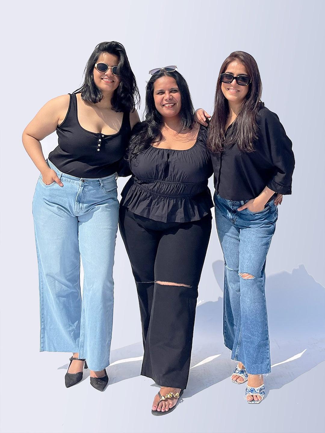 Friends chilling, wearing Rerasa Wild Leg Jeans